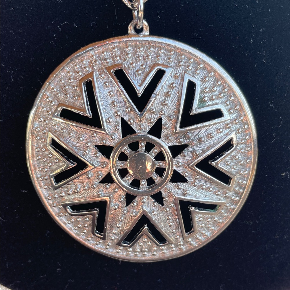 Lisner Vintage Necklace with round silver-tone filigree open-work pendant
